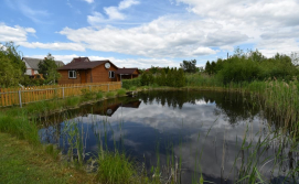 Ставок на території котеджу Затишок