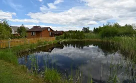 Ставок на території котеджу Затишок